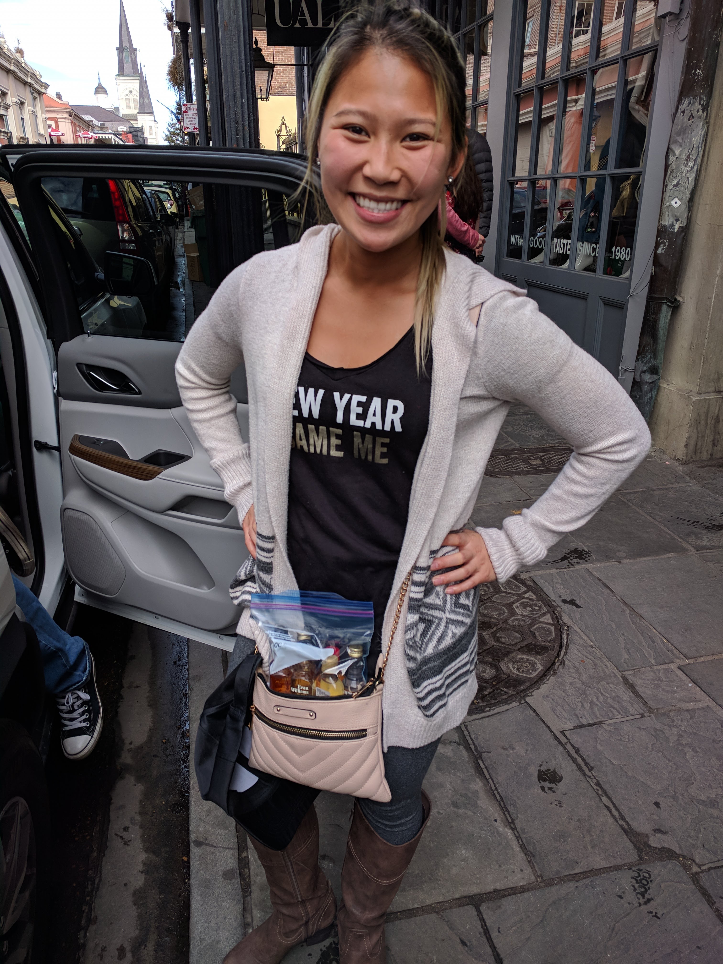 Only in Nola can you walk around cheesing this hard with nips bursting out your purse.